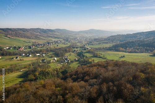 Iwkowa village country in Brzesko Poland. Polish mountains and hills aerial drone photo