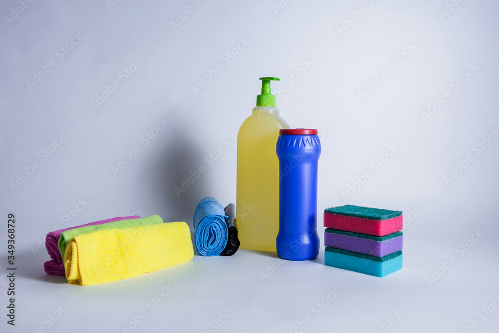 Room cleaning kit. A set of multi-colored cleaning cloths, sponges for washing dishes, cleaning and detergent, garbage bags.