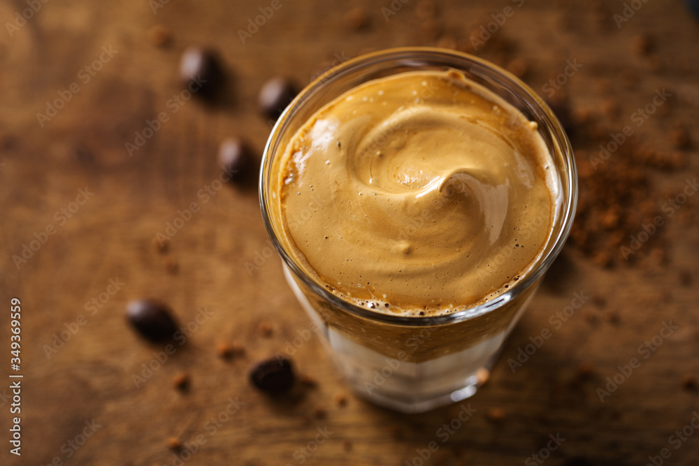 Dalgona coffee with whipped foam in cup Dalgona coffee with whipped foam in cup