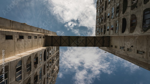 Brutalist Architecture in Tbilisi. Under the bridge connecting the two buildings.