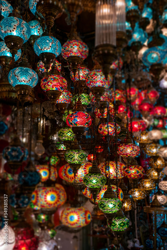 Bright colorful multicolored traditional Turkish lanterns hanging out at a bazaar.