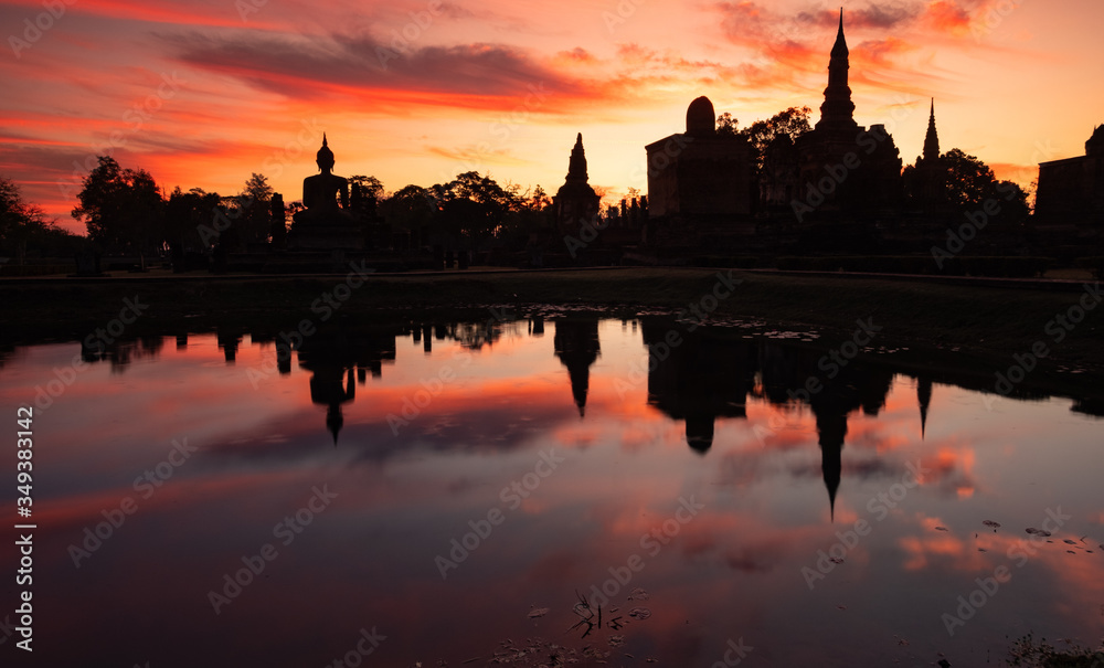 sunset  sunrise over Thai temple on a lake