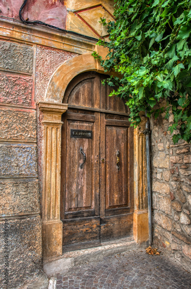 An old wooden door in old town Verona