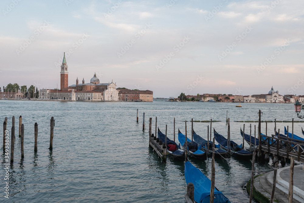 moored gondolas,in the background it can be seen the Saint Giorgio Maggiore's  church