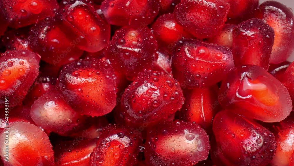 Fresh red pomegranate seeds. Close up. Fresh red pomegranate seeds. Close up.