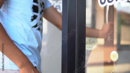 Man open door shop coffee close up