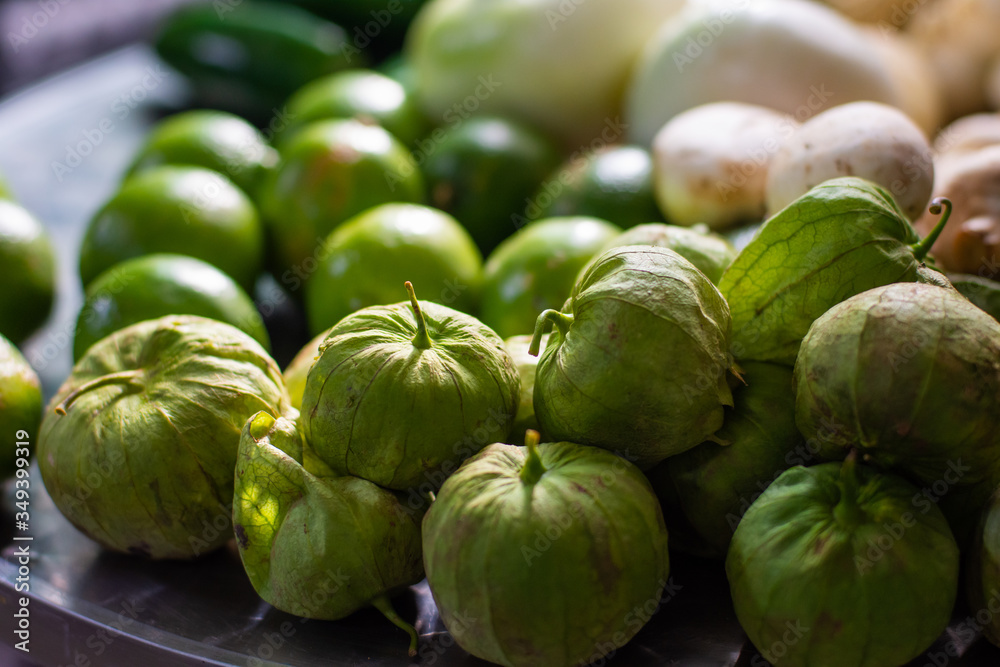 Close up of some fresh tomatillo on a table Close up of some fresh tomatillo on a table