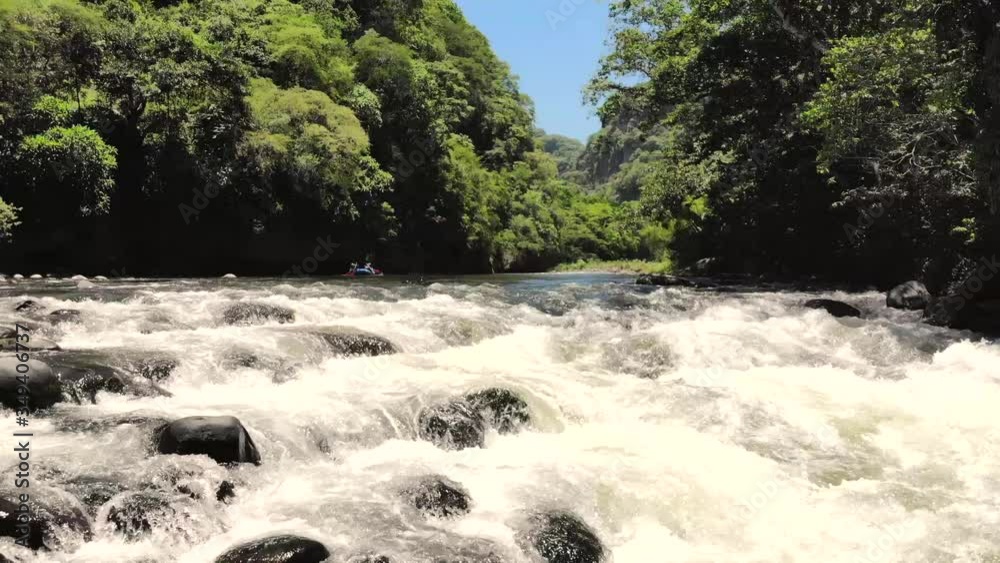 River waterfall  and boat comming