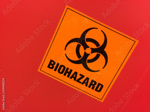 biohazard red label container for needles and syringes