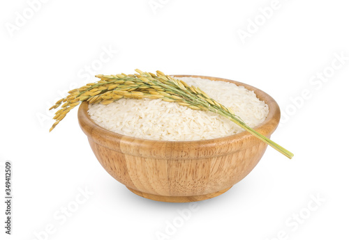 white rice (Thai Jasmine rice) in the wooden bowl with unmilled rice isolated on white background