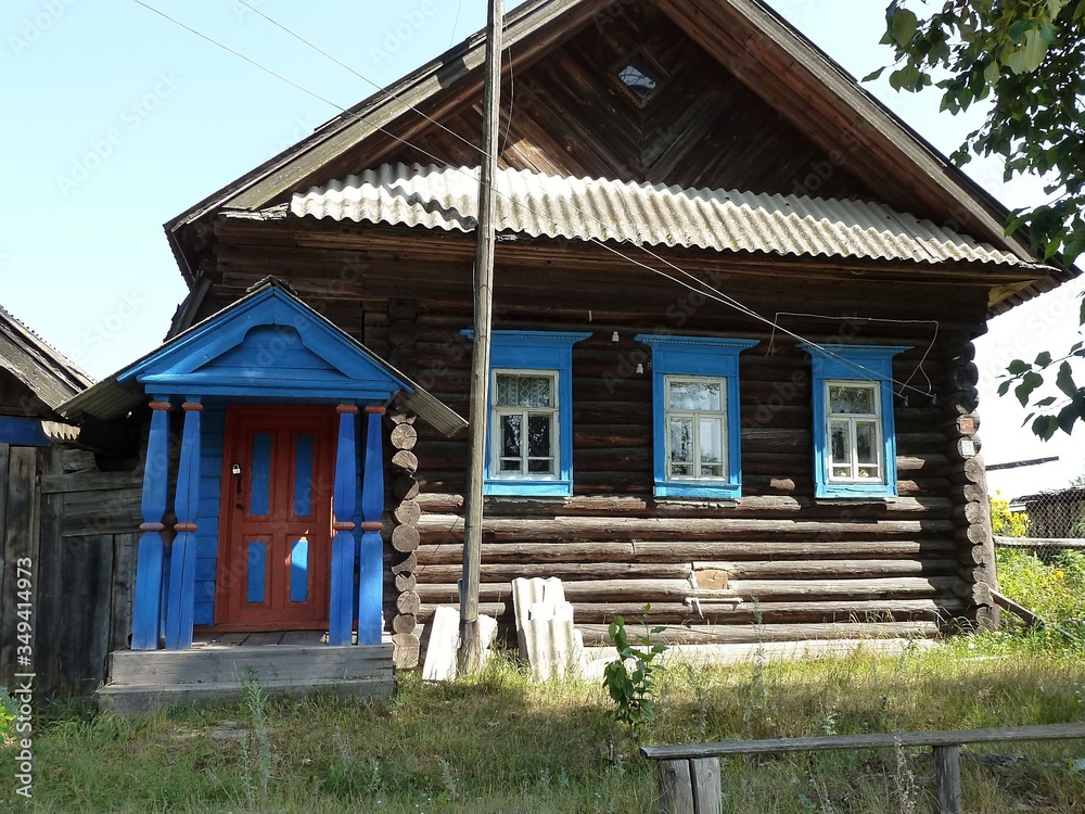 A standard village hut with a front painted porch A standard village hut with a front painted porch