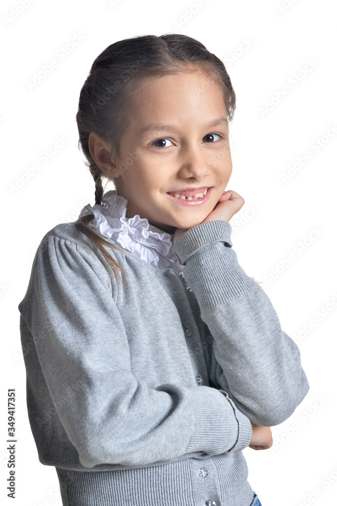 Portrait of cute little girl posing isolated on white background