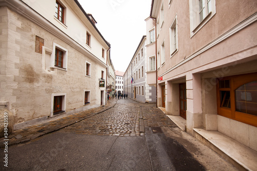 Fototapeta Naklejka Na Ścianę i Meble -  Narrow empty historical streets in winter, in the old town Bratislava, Slovakia