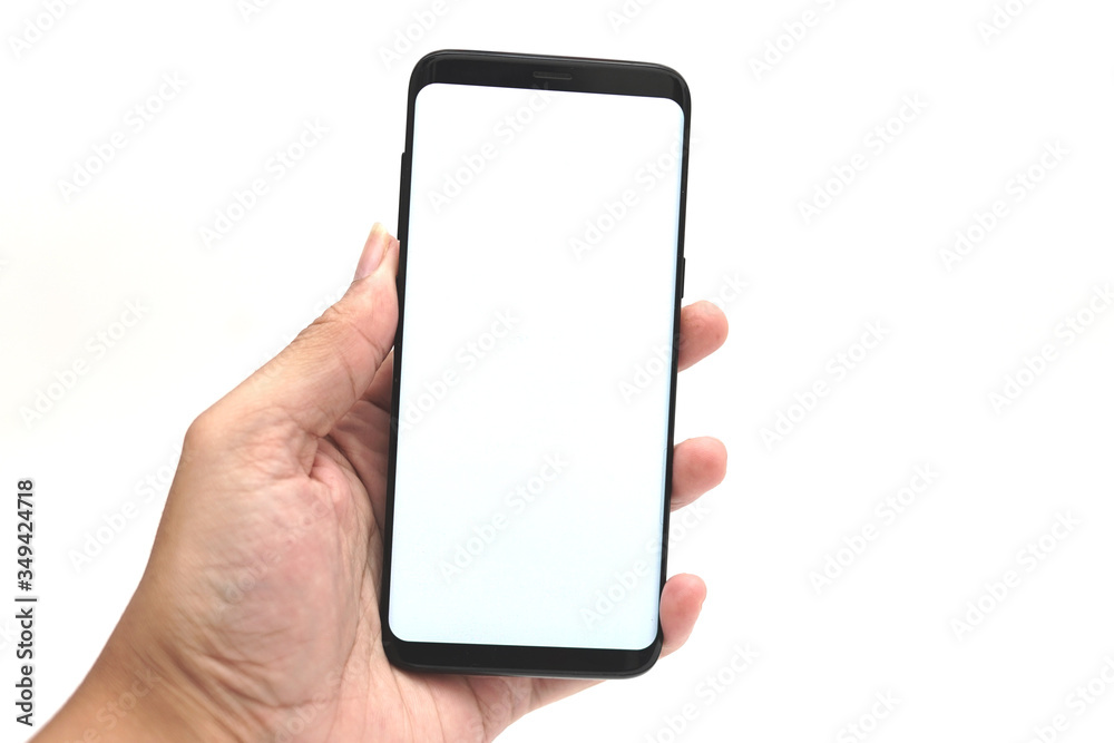 Hand with blank smart phone on portrait mode for mock up Hand with blank smart phone on portrait mode for mock up