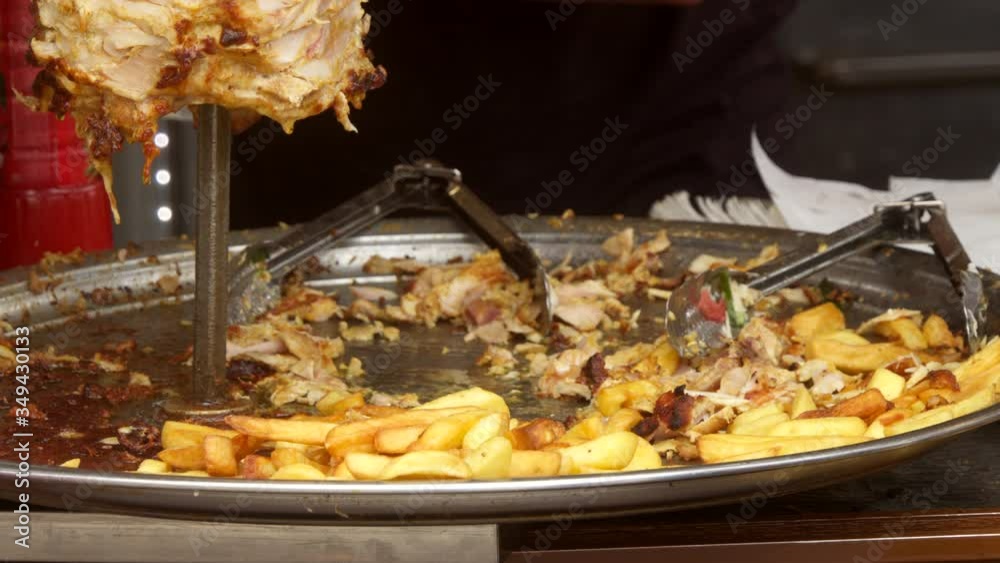 Cook fries grilled meat shawarma Cook fries grilled meat shawarma