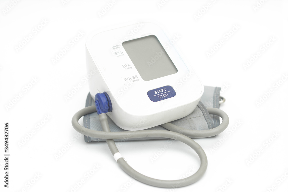 Close up digital blood pressure measurement over white background. Close up digital blood pressure measurement over white background.