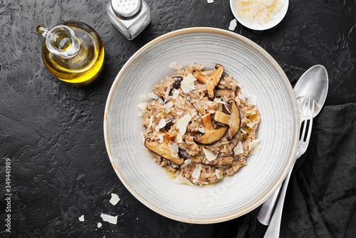 Fotografie Classic  italian risotto with mushrooms and parmesan cheese.