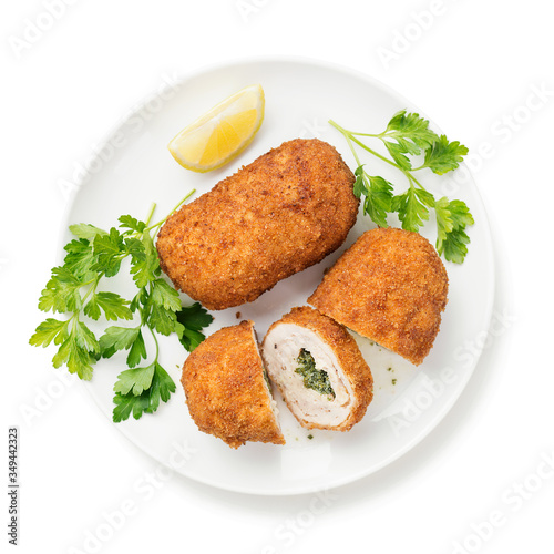 Breaded Chicken Kiev breast stuffed with butter, garlic and herbs. isolated on white background	
