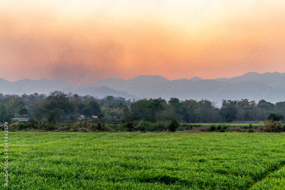 Northern Thailand During the Burning Season causes a beautiful sunset