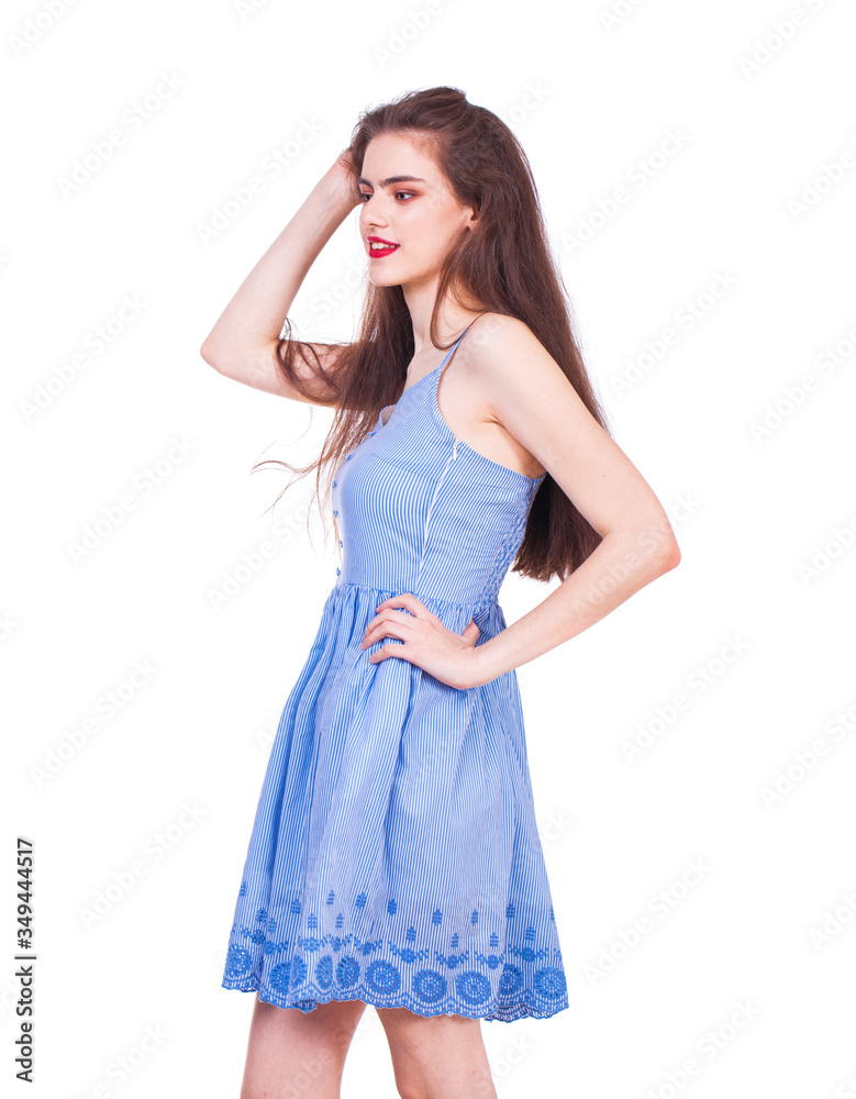 Fashion portrait of a young beautiful woman in dress Fashion portrait of a young beautiful woman in dress
