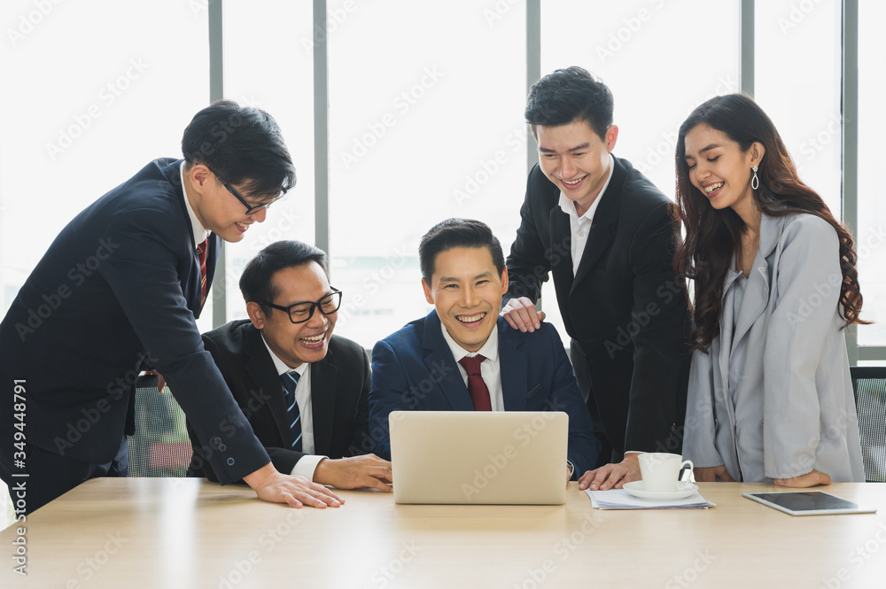 Asian business people team analyzing statistics financial. Team of businesspeople Meeting Conference Discussion Corporate Concept in office. Asian business people team analyzing statistics financial. Team of businesspeople Meeting Conference Discussion Corporate Concept in office.