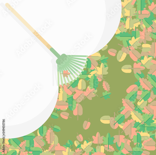 A rake cleared the lawn of the garden from autumn leaves..Garden lawn care card.