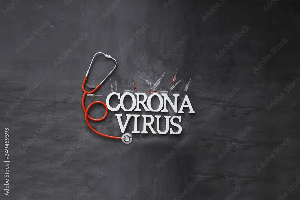 Obraz premium Medical background. Lettering virus. Coronavirus wooden letters. Background of the deadliest pandemic virus in the world. Vaccine for the virus.