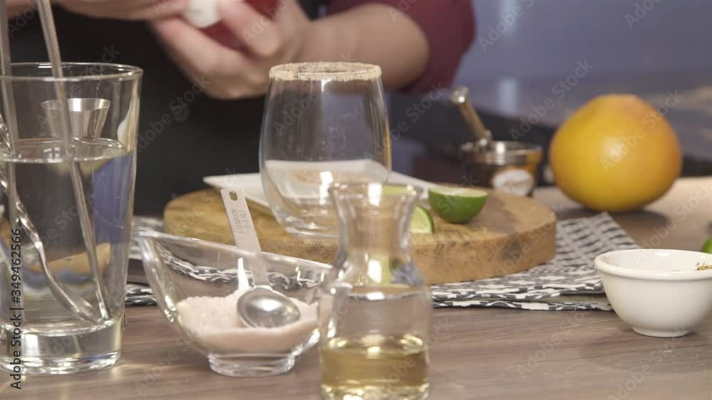 pouring syrup into the jigger then to the glass - static pouring syrup into the jigger then to the glass - static