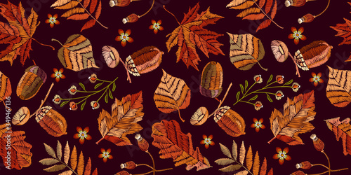 Autumn, vintage horizontal seamless pattern. Embroidery art. Leaves, acorns, wild forest. Fashionable template for design of clothes, t-shirt design