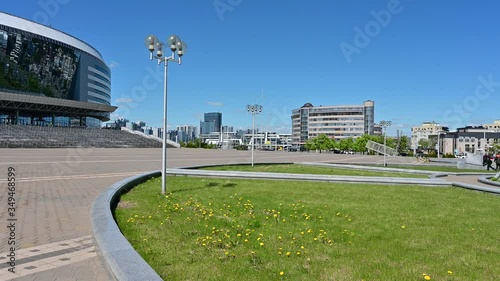 Minsk, Belarus - May 16, 2020 - almost empty roadway and sidewalks in the sun photo