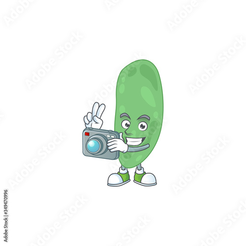 Thermus thermophilus photographer mascot design taking a picture with a camera