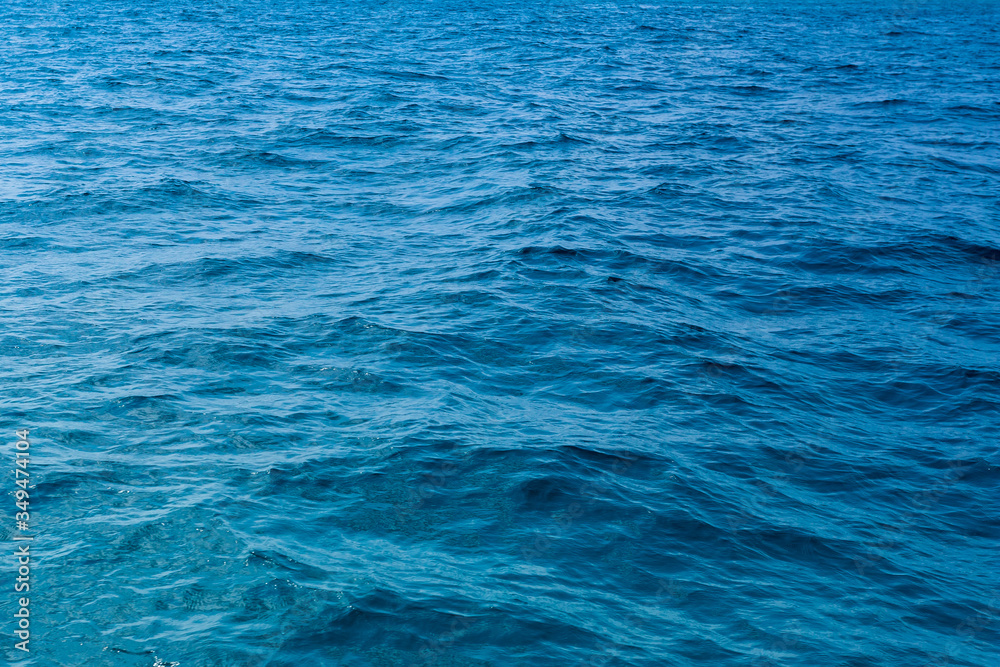 Water texture,Surface blue sea water. Texture of water with small waves,Water surface background Water texture,Surface blue sea water. Texture of water with small waves,Water surface background