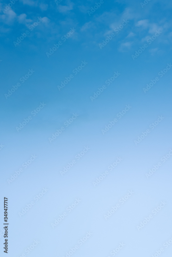 vertical image of a blue sky with a gradient