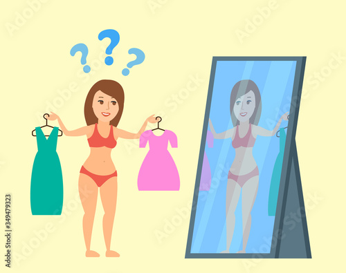 woman in lingerie choose a dress try on clothes in front of mirror