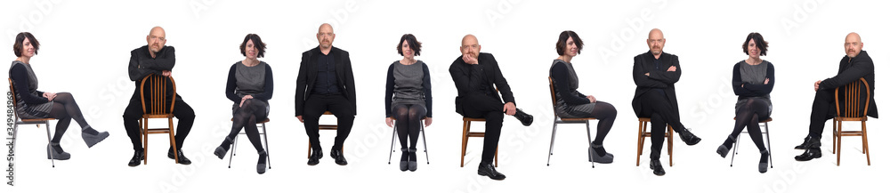 Obraz premium the same elegant couple sitting on white background
