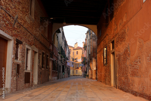 Venice's colorful streets, long corridors. © Raquel