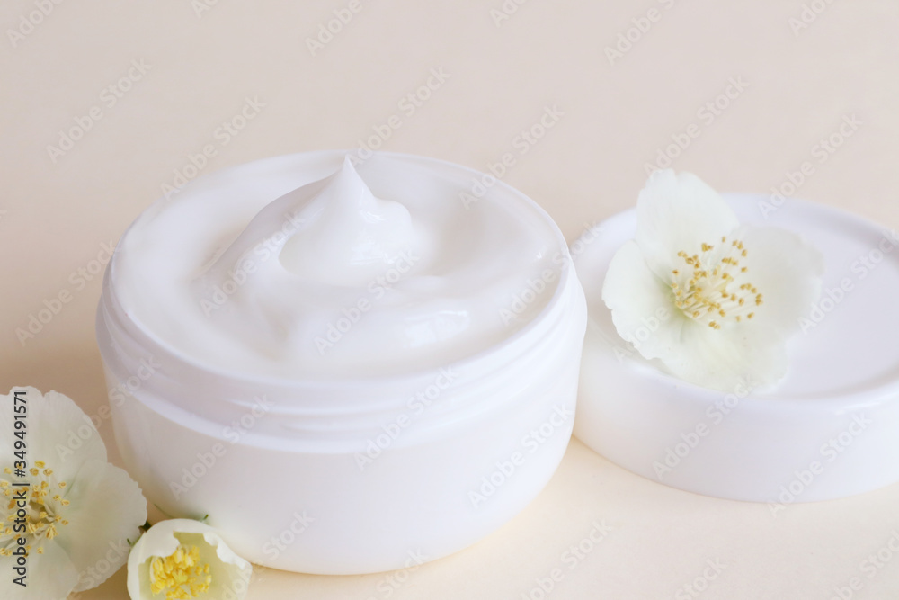 Cream moisturizer in the white jar. The concept of health and beauty. Cream moisturizer in the white jar. The concept of health and beauty.