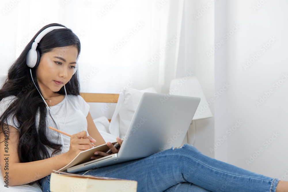 An Asian woman Education online from home. An Asian woman Education online from home.