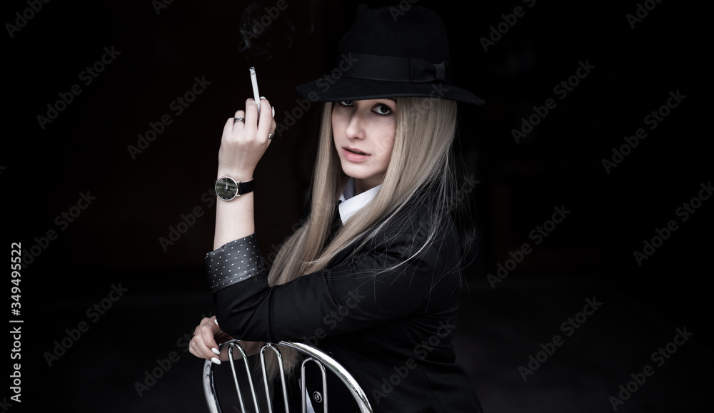Φωτογραφία Elegant woman smoking, cinema style, artistic commercial photo for some campaign