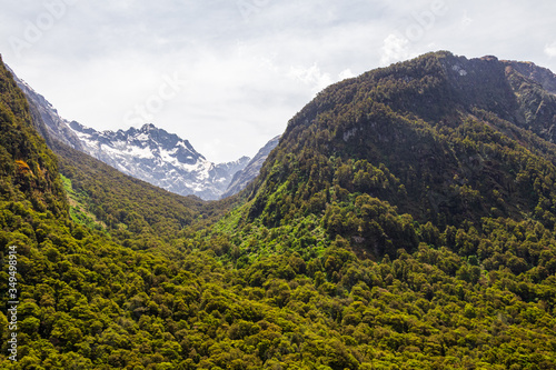 Landscapes of Fiordland National Park. View of the snow-capped mountains. South Island, New Zealand