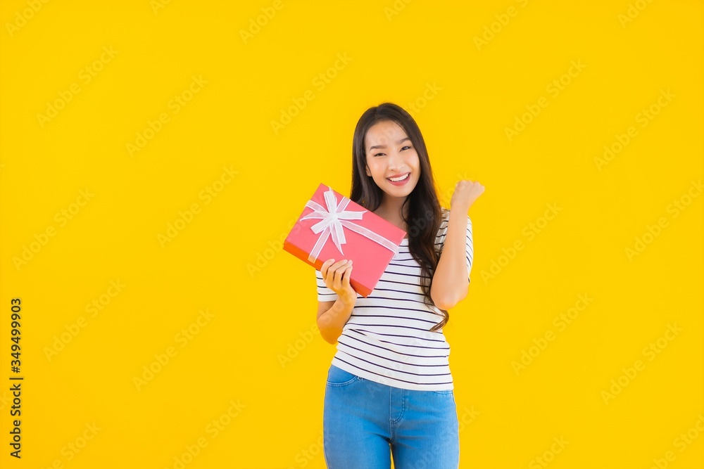 Portrait beautiful young asian woman show red gift box Portrait beautiful young asian woman show red gift box