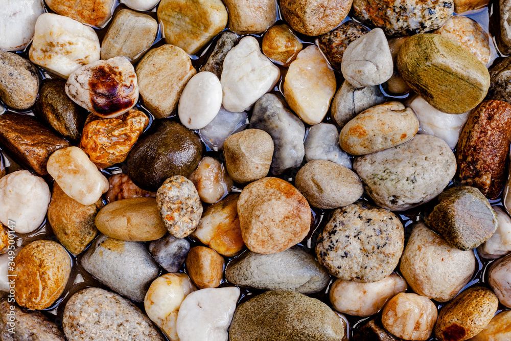 Close up of rounded and polished river rocks. pattern rock. Close up of rounded and polished river rocks. pattern rock.