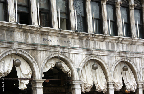 Part of facade of Procuratie vecchie on San Marco square in Venice.