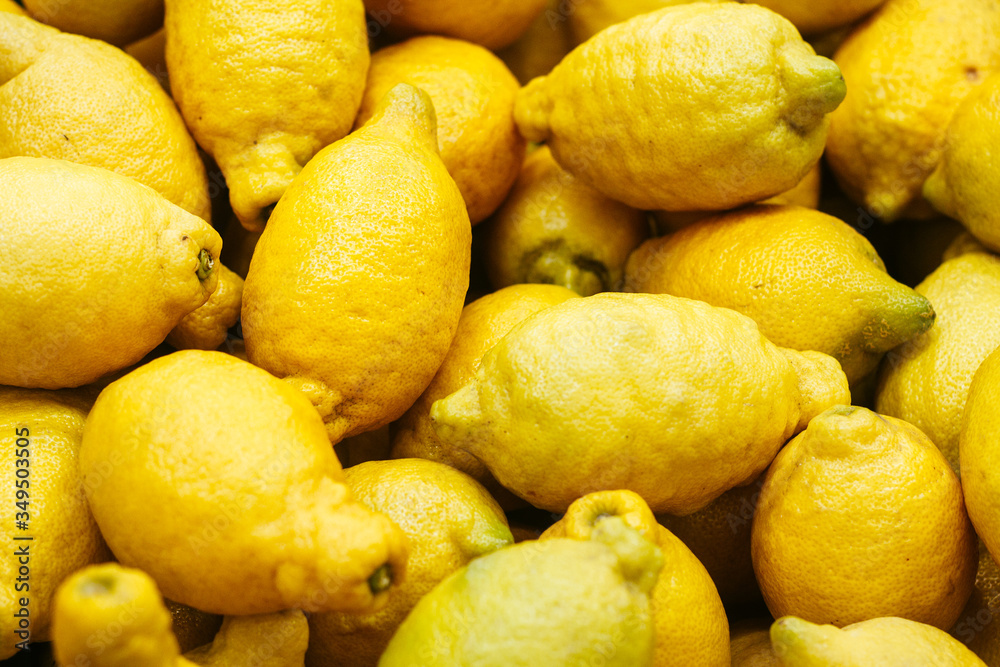 ripe yellow lemons close-up
