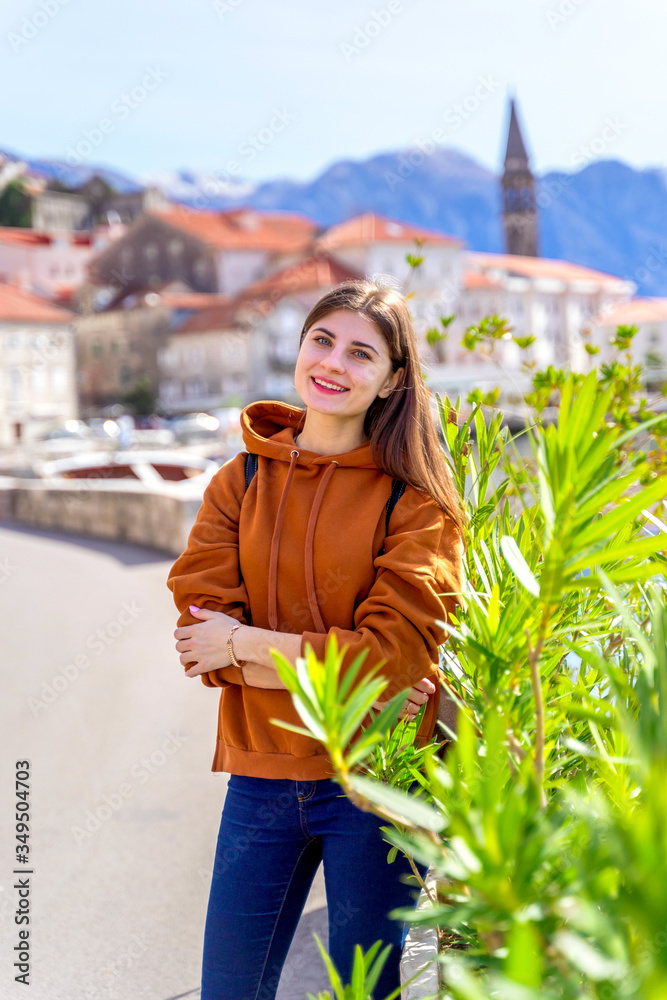 Fototapeta premium Coronavirus is over and borders are open. Now you can travel. Woman have vacation on europen resort.