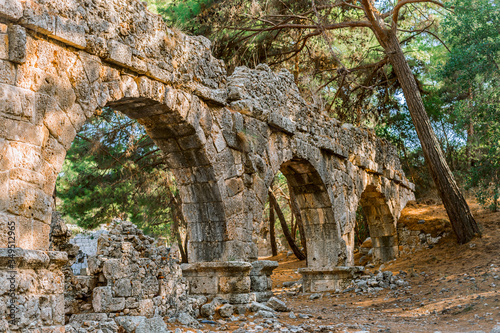  Ruins of the aqueduct in the ancient Phaselis city  Turkey. Travel and architecture.