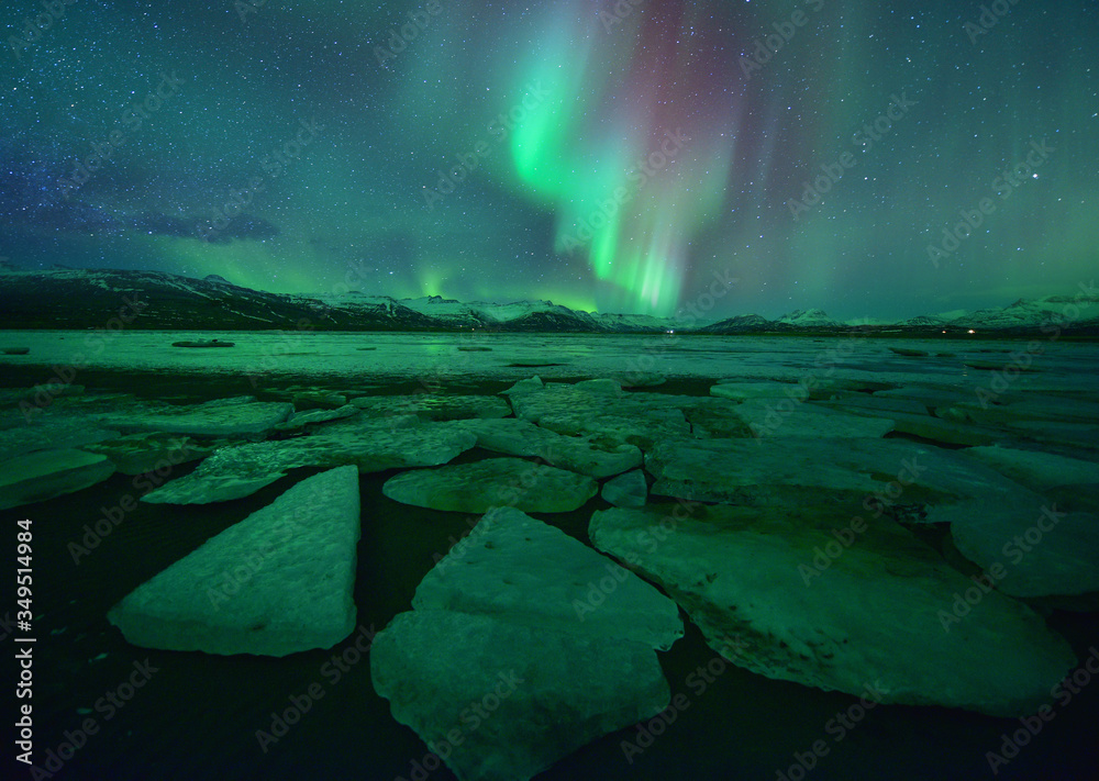 Beautiful aurora over famous Diamond beach at night,night landscape, Iceland
