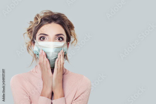 Shocked woman in protective face mask