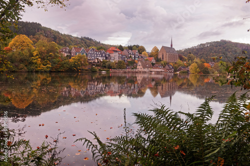View of Old Beyenburg in autumn colors during a cloudy morning.