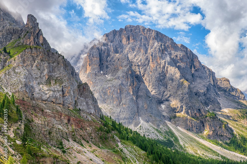 Beautiful mountain view in the dolomites with a hiking trail on the mountainside